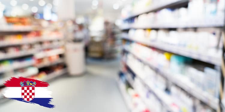 A store shelf with personal care products, slightly out of focus, with a Croatia logo in the lower left corner.