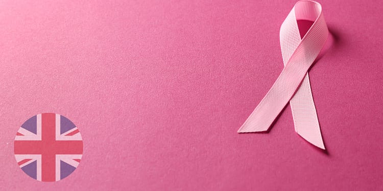 Pink ribbon on a pink background.